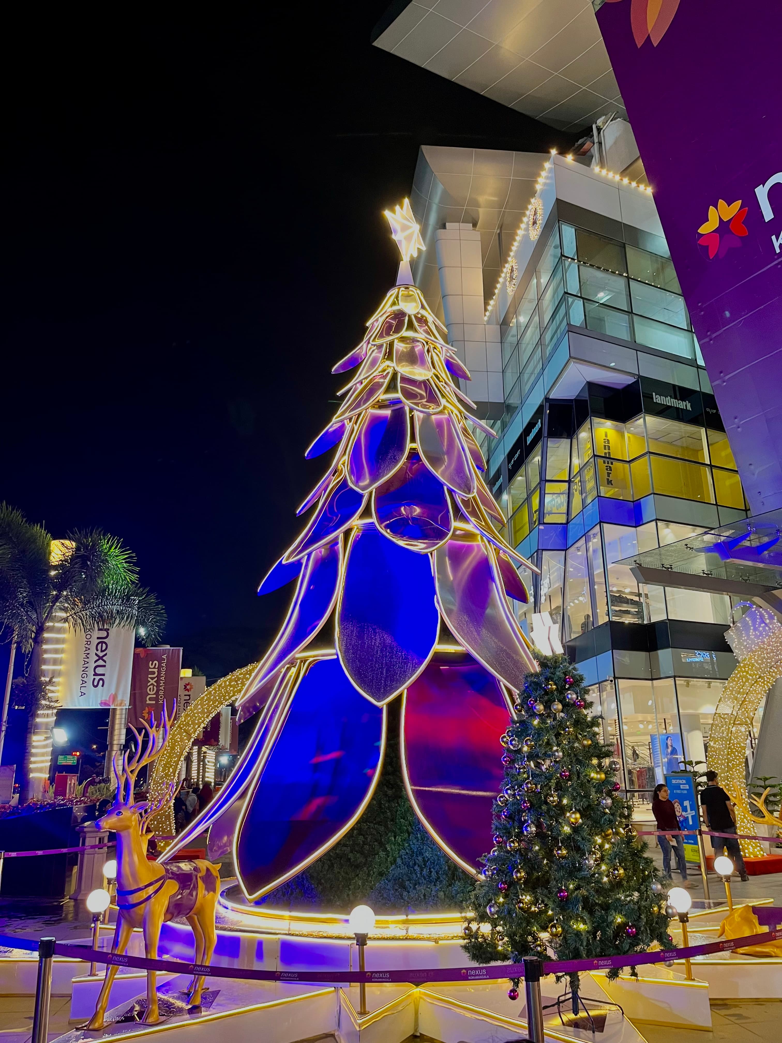 Illuminated Christmas tree installation at a mall in Bangalore